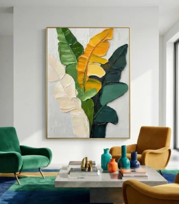Textured contemporary hand-painted canvas featuring layered botanical leaves in cream, green, and golden yellow tones, modern living space