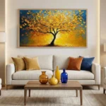 Textured abstract hand-painted canvas depicting golden tree with layered leaf details in warm yellows and cool blues, contemporary living space