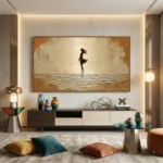 Textured figurative hand-painted canvas depicting a silhouetted woman dancing by golden waters in warm ochre tones, contemporary living space