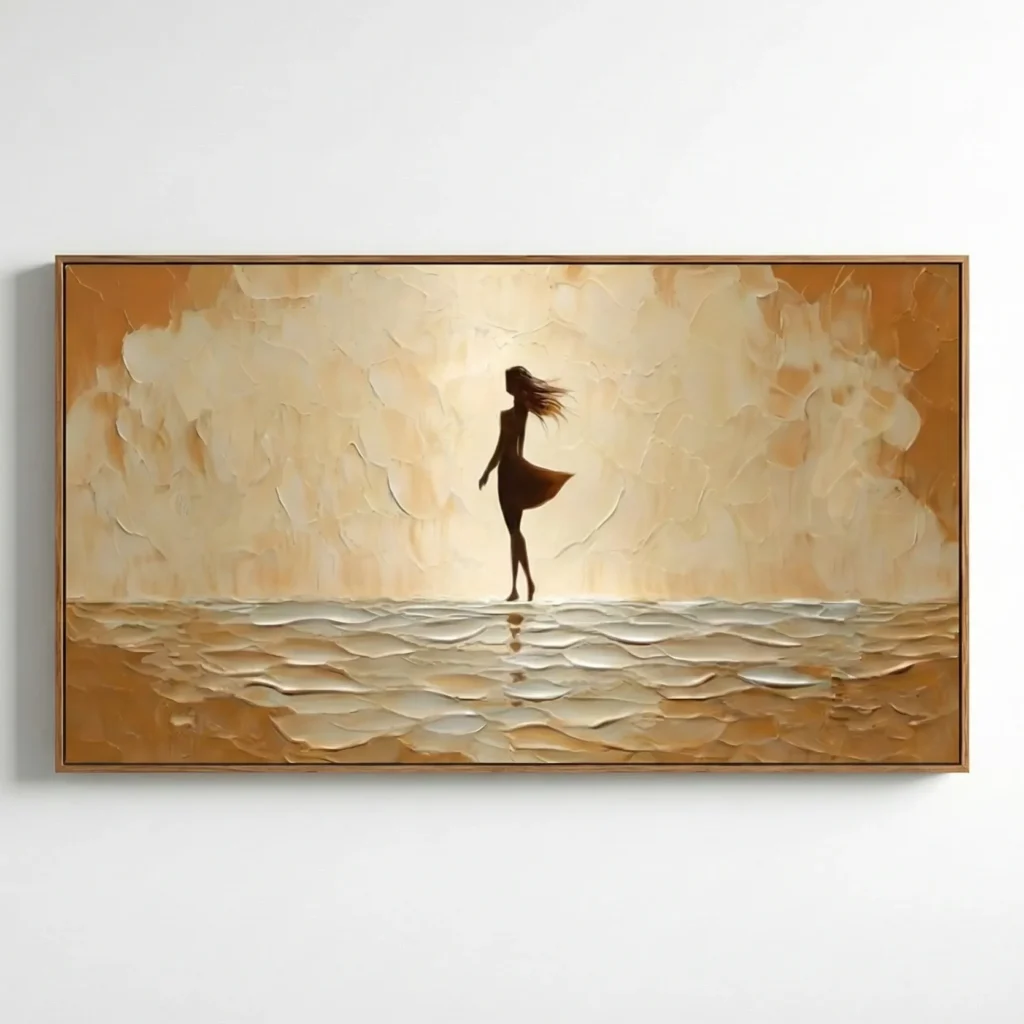 Textured hand-painted canvas depicting a silhouetted figure on a beach beneath golden sky, cream and ochre palette, contemporary living space