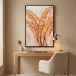 Contemporary hand-painted canvas featuring golden palm fronds in warm ochre and terracotta tones, modern workspace