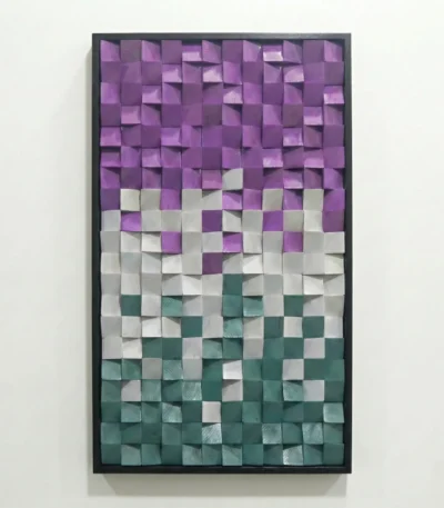 Textured abstract hand-painted canvas in purple, grey, and teal gradient with dimensional square patterns, white wall backdrop
