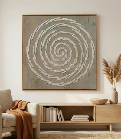 Textured abstract hand-painted canvas featuring concentric white spiral brushstrokes on muted taupe ground, contemporary living space