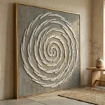 Chalk Whorl textured wall art shown framed on the wall in a styled interior