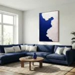 Textured minimalist hand-painted canvas with bold navy and cream silhouette profile, contemporary living space