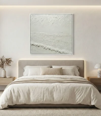 Minimalist textured hand-painted canvas depicting serene seascape with soft horizons in monochromatic white and cream tones, modern bedroom