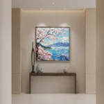 Impressionist hand-painted canvas depicting Mount Fuji with cherry blossoms and blue waters in soft pink and turquoise tones, contemporary entryway