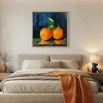Contemporary hand-painted canvas depicting two vibrant orange citrus fruits with green leaf on dark blue and green layered background, modern bedroom