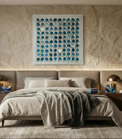 Minimalist hand-painted canvas with geometric circular motifs in layered teal and cream tones, contemporary bedroom