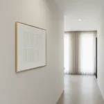 Minimalist hand-painted canvas with geometric grid and linear patterns in cream and white tones, contemporary hallway