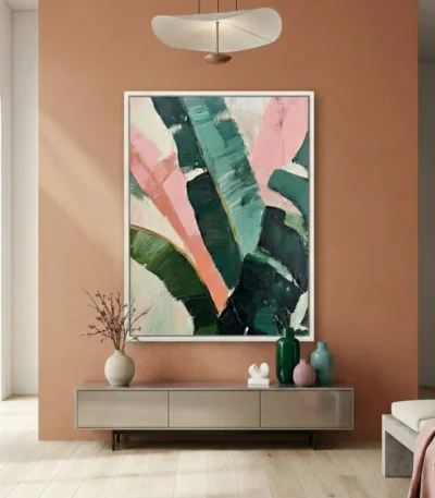 Gestural abstract hand-painted canvas with bold pink, forest green, and teal brushstrokes on cream, contemporary living space