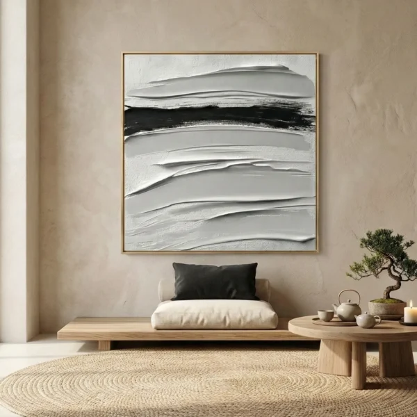 Gestural abstract hand-painted canvas with layered horizontal brushstrokes in cream, gray, and black, contemporary interior setting