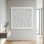 Textured monochrome hand-painted canvas featuring layered white feather patterns with dimensional relief detail, contemporary entryway