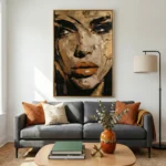 Gestural expressionist hand-painted canvas depicting a woman's face in bold black and ochre strokes, contemporary living space
