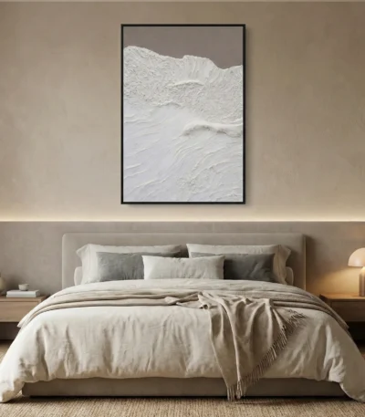 Textured abstract hand-painted canvas in monochromatic white and cream with layered gestural brushstrokes, modern bedroom