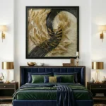 Textured abstract hand-painted canvas with layered gold and black gestural marks, cream and charcoal palette, contemporary bedroom