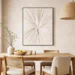 Minimalist abstract hand-painted canvas with radiating cream and taupe brushstrokes converging at center, contemporary dining space
