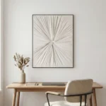 Minimalist hand-painted canvas with radiating linear composition in soft cream and gray tones, contemporary workspace