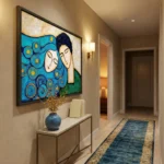 Contemporary figurative hand-painted canvas depicting two serene faces with swirling blue patterns and golden accents, hallway setting