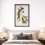 Contemporary figurative hand-painted canvas depicting two cockatoos in cream and gold tones, modern bedroom setting