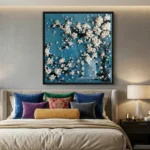 Textured abstract hand-painted canvas with cream clustered spheres floating on deep teal background, contemporary bedroom