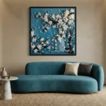 Textured abstract hand-painted canvas with ivory botanical clusters on deep teal background, contemporary living space