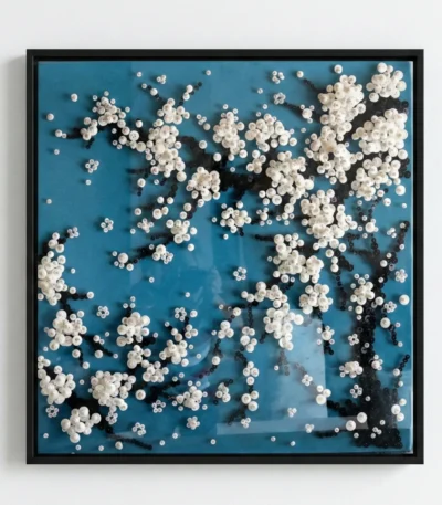 Textured abstract hand-painted canvas with cream and ivory dimensional beads against deep teal and black background, contemporary living space