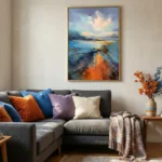 Expressionist landscape hand-painted canvas depicting golden sunset over turquoise waters and rocky coastline in warm and cool tones, contemporary living space
