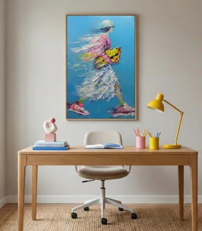 Contemporary figurative hand-painted canvas depicting a woman composed of layered fish and marine life in vibrant pink, yellow, and blue tones, styled workspace