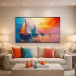 Impressionist hand-painted canvas depicting sailboats at sunset in vibrant blues, oranges and pinks, contemporary living space