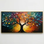 Textured abstract hand-painted canvas of a gnarled tree with vibrant multicolored foliage against warm golden sky, contemporary living space