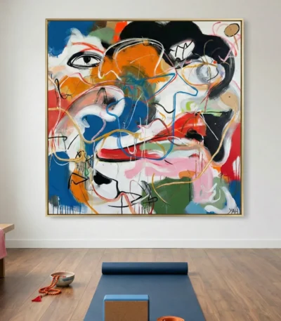 Gestural abstract expressionist hand-painted canvas layered with bold geometric forms and vibrant multicolored brushstrokes, yoga studio setting