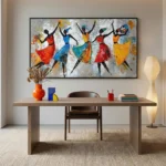 Contemporary figurative hand-painted canvas depicting five dancing women in vibrant red, blue, yellow and orange, textured neutral backdrop, modern workspace