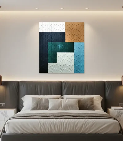 Layered abstract hand-painted canvas in navy, teal, cream and ochre with textured diagonal patterns, contemporary bedroom