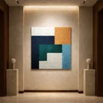 Geometric abstract hand-painted canvas in navy, teal, mustard and cream with textured patterned sections, contemporary gallery space