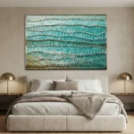 Layered abstract hand-painted canvas with wavy linear patterns in turquoise, teal, and gold tones, modern bedroom