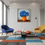 Contemporary hand-painted canvas depicting vibrant blue flowers in an orange vase, warm and cool palette contrast, modern living space