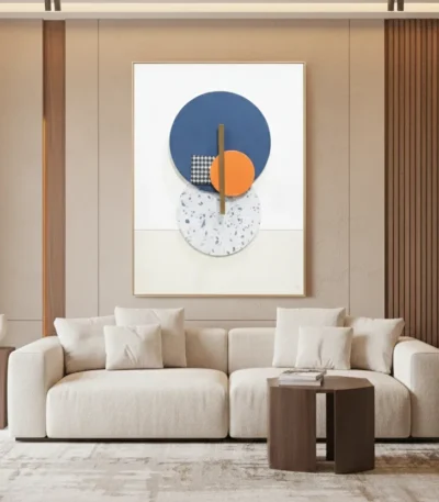 Contemporary abstract hand-painted canvas with layered geometric circles, checkered patterns and orange accent in blue and cream tones, modern living space