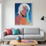 Contemporary figurative hand-painted canvas depicting stylized female profile in coral, turquoise, and deep blue tones, modern living space
