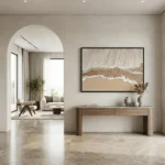 Minimalist abstract landscape hand-painted canvas in cream and taupe with gestural brushwork, contemporary entryway