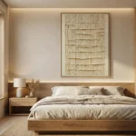 Textured abstract hand-painted canvas with layered cream and ivory brushstrokes, contemporary bedroom