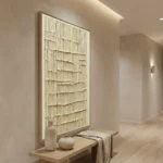 Textured abstract hand-painted canvas in cream and ivory with layered horizontal relief marks, contemporary entryway