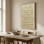 Textured minimalist hand-painted canvas with layered cream and beige striations, contemporary dining space