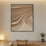 Textured abstract hand-painted canvas in warm earth tones with flowing gestural brushstrokes, contemporary living space