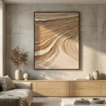 Textured abstract hand-painted canvas with flowing organic waves in warm sand and cream tones, contemporary living space