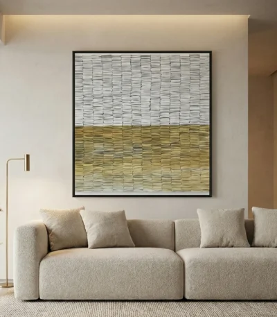 Textured abstract hand-painted canvas in layered cream and golden ochre horizontal bands, contemporary living space