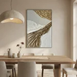 Textured abstract hand-painted canvas in layered cream, white and gold brushstrokes, contemporary dining space