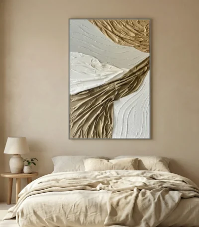 Textured abstract hand-painted canvas with swirling gold and cream brushstrokes, contemporary bedroom