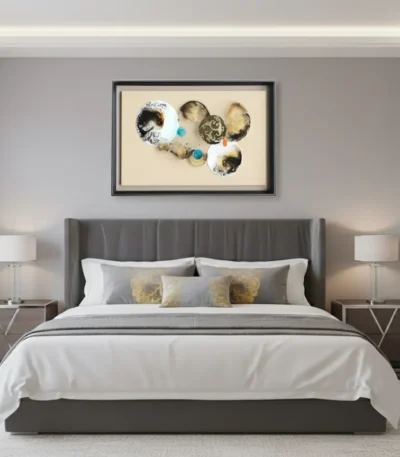 Abstract hand-painted canvas with organic circular forms in cream, gold, and blue tones, modern bedroom