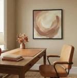 Gestural abstract hand-painted canvas with swirling cream and terracotta brushstrokes, contemporary office space